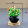 Potted bloom: 8cm Mini Artificial Mixed Flower & Grass Potted Plant (White/Black Pot)