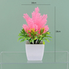 Potted bloom: 12cm Mini Artificial Orchid-Style Flower Potted Plant in Striped Pot