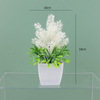Potted bloom: 12cm Mini Artificial Orchid-Style Flower Potted Plant in Striped Pot